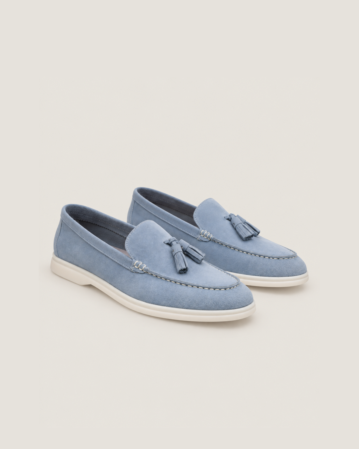 The Emmaus Loafer in Capri Mist, pair of suede tassel loafers