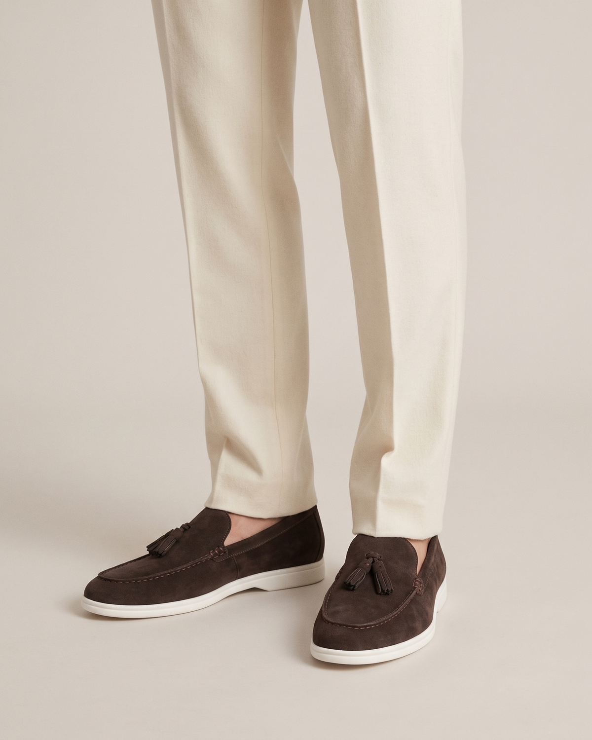 The Emmaus Loafer in Espresso, worn with ivory wool trousers