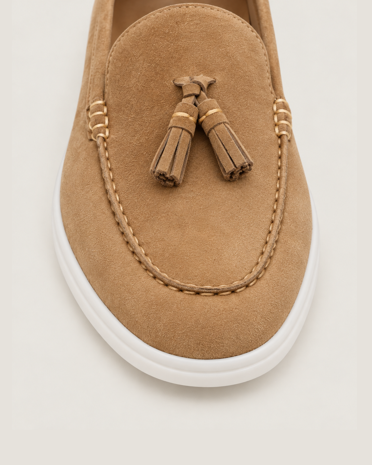 The Emmaus Loafer in Siena Camel, stitched moc toe and leather tassels detail