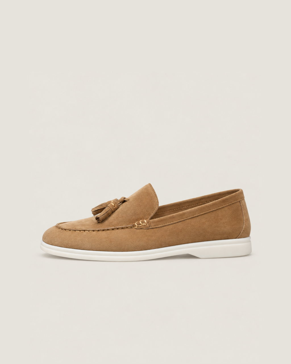 The Emmaus Loafer in Siena Camel, side profile with white rubber sole