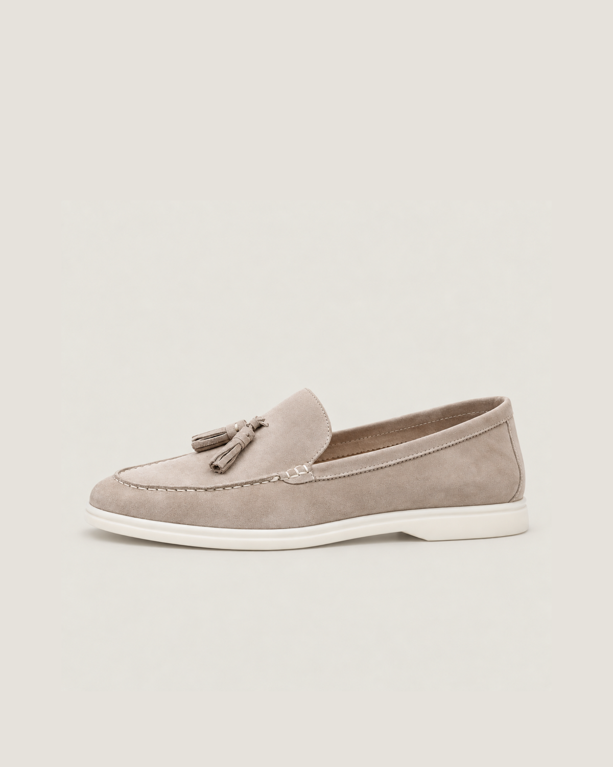 The Emmaus Loafer in Taupe, side profile with white rubber sole