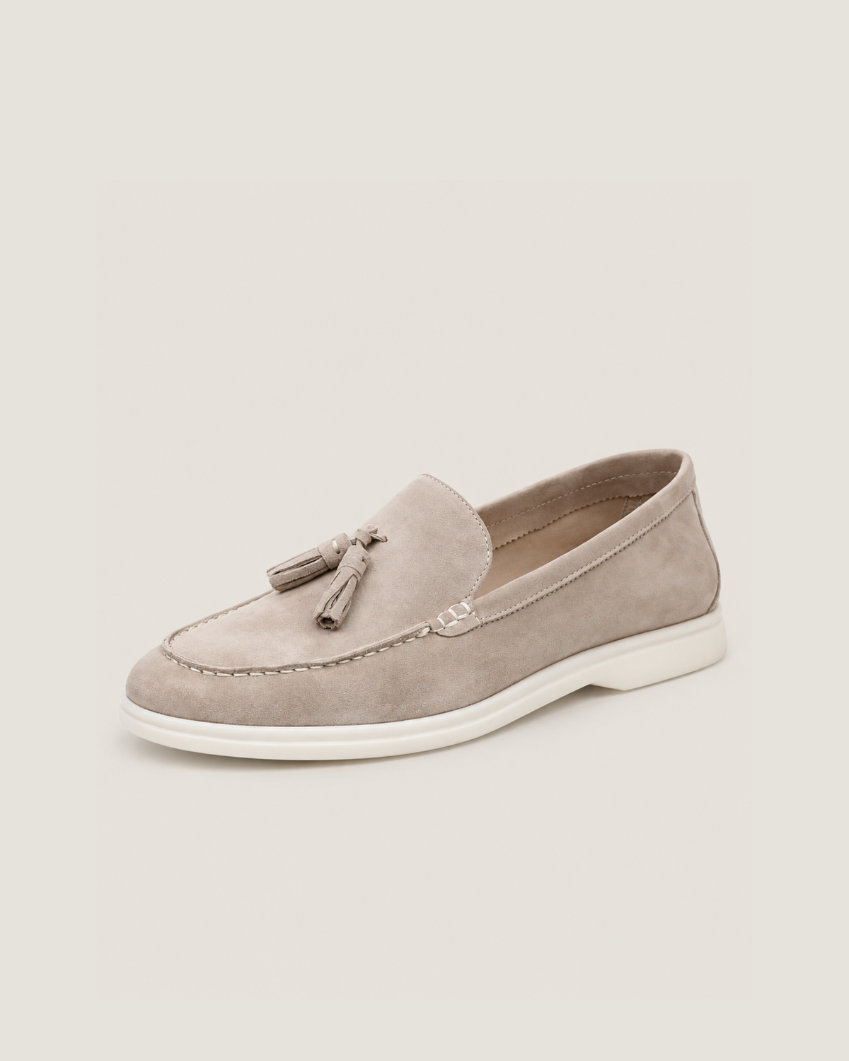 The Emmaus Loafer in Taupe, suede tassel loafer for men, three-quarter view